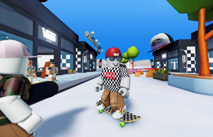 A Roblox character dressed in clothing from Vans, who is skating on a skateboard. 
